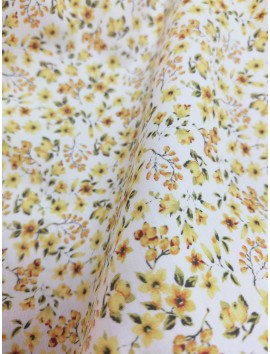Tela de algodón tipo liberty flores amarillas