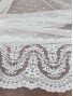 Tul blanco con bordado y plumeti , ondas y flores