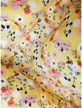 Tela de Viscosa con flores fondo amarillo