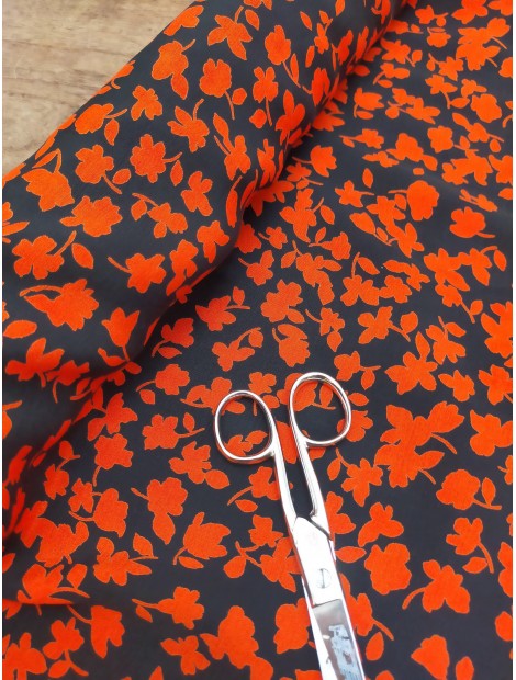 Tela Satén estampado silueta flor naranja coral