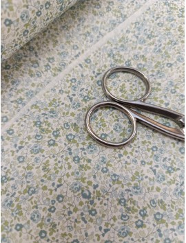 Tela de algodón estampado flores azules  hojas menta