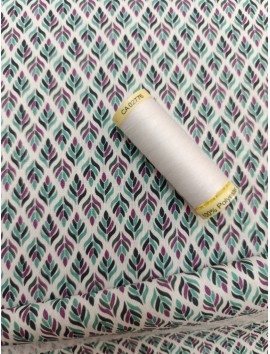 Tela de algodón estampado hojas menta y magenta