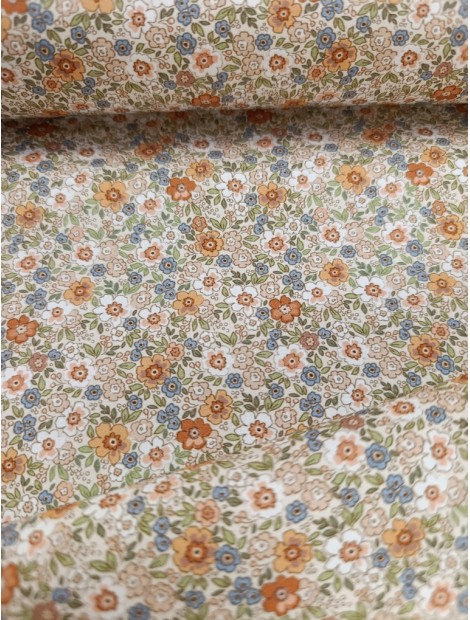 Tela de algodón estampado flores ocres y azules