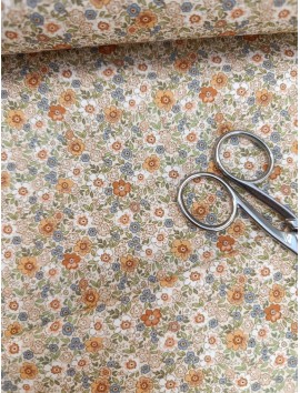 Tela de algodón estampado flores ocres y azules
