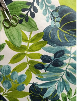 Mantel resinado , teflón , hojas verdes