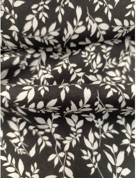 Tela viscosa  ramas blancas fondo negro