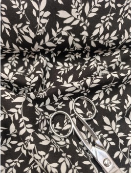 Tela viscosa  ramas blancas fondo negro