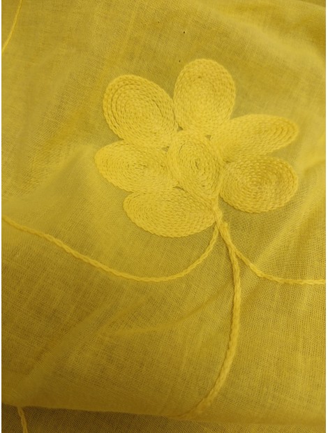 Batista amarilla de algodón con flores color